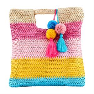 Colorful striped crochet bag with pom-poms and tassels on a white background