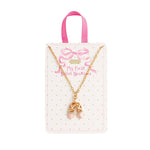 Gold chain necklace with pink enamel ballet slippers charm on polka dot display card for kids
