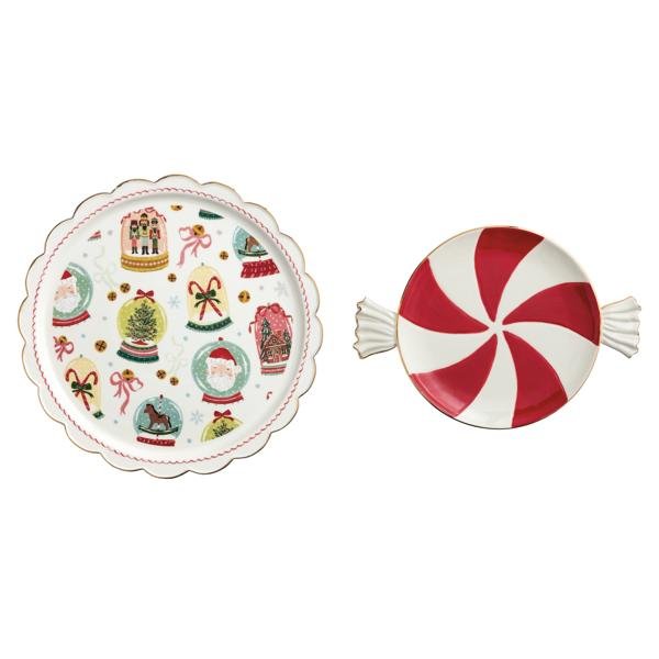 Hand-painted nested Christmas candy platters featuring a red peppermint swirl and festive holiday icons