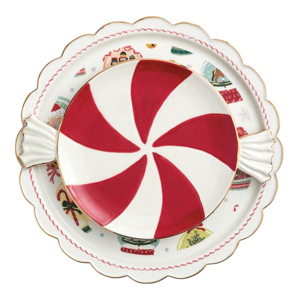 Hand-painted nested Christmas candy platters featuring a red peppermint swirl and festive holiday icons