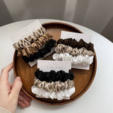 NEW TEMPERAMENT SET SIMPLE HAIR SCRUNCHIES by ACCITY at Confetti Gift and Party Tuscaloosa Alabama