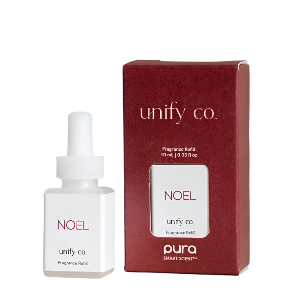 Noel Pura fragrance refill with bergamot, orange zest, black cherry, cassis, Japanese plum, cardamom, vetiver, amber, and sandalwood.