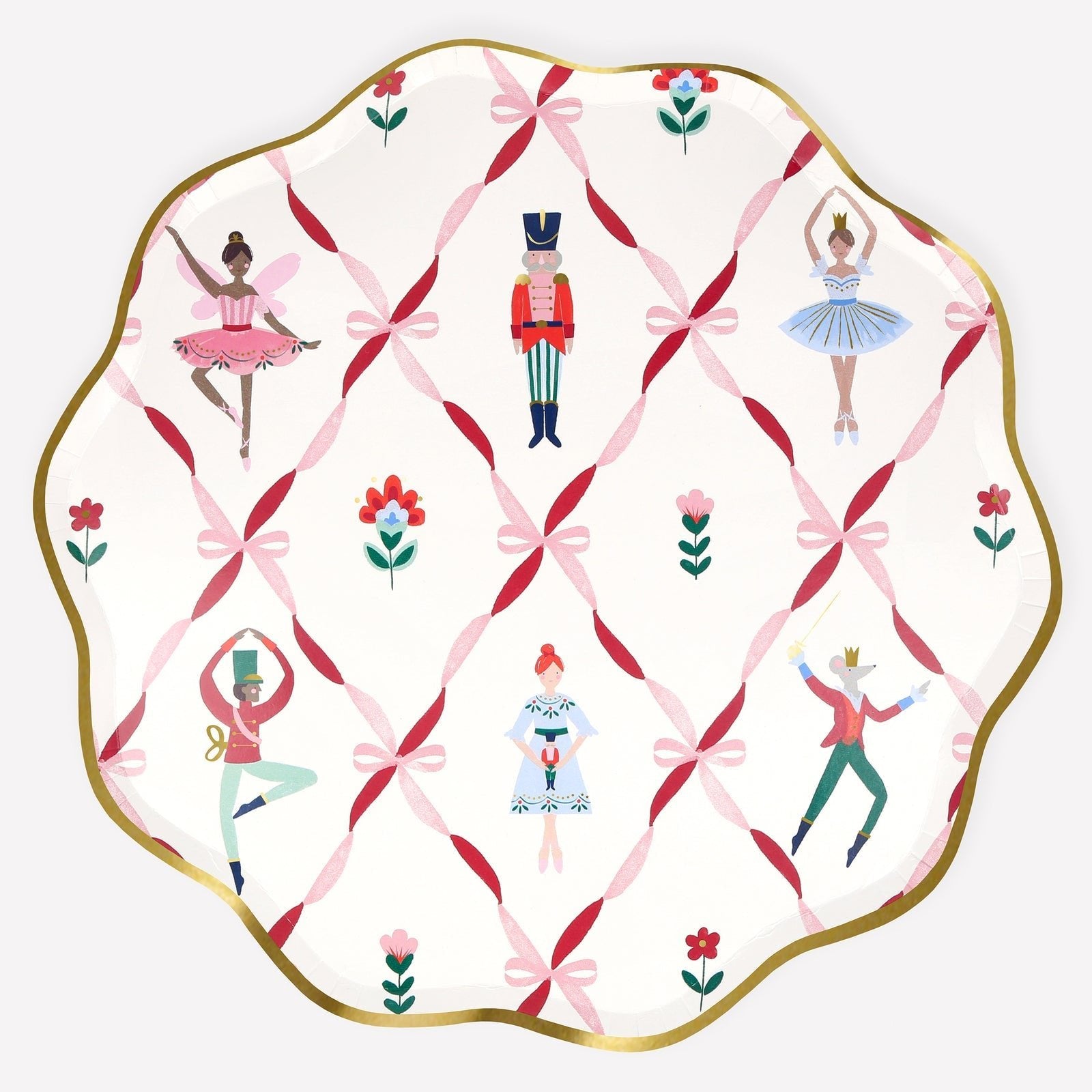 Nutcracker Ballet paper plates with gold foil trim and dancers, nutcracker, and bow design