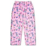 Children’s pink Nutcracker Waltz plush pants featuring festive Nutcracker, ballerina, drum, and candy illustrations with elastic waistband.