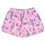 Children’s Nutcracker Waltz plush shorts with pink background and Nutcracker ballet print, featuring back pocket and elastic waistband.