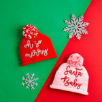 red toddler Christmas hat with oh so merry tinsel lettering and pom pom