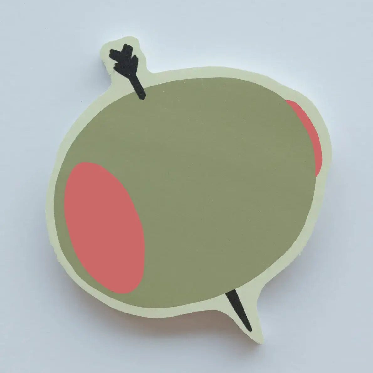 Olive-shaped die-cut sticky note pad with pimento and toothpick design by Idlewild Co.