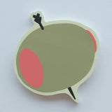 Olive-shaped die-cut sticky note pad with pimento and toothpick design by Idlewild Co.