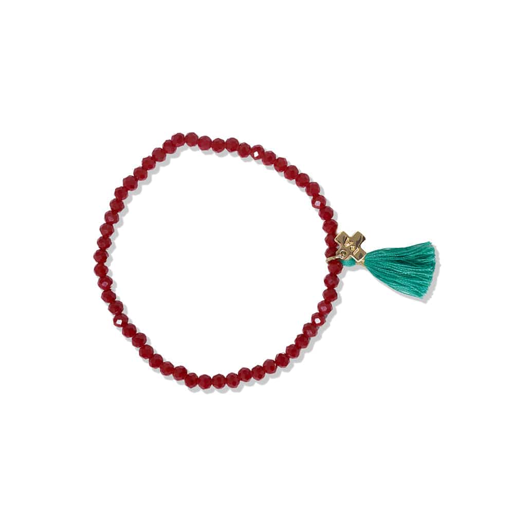Patsy Solid Crystal Stretch Bracelet With Tassel by Ink + Alloy at Confetti Gift and Party