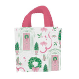 Pink and green holiday tote bag with wreaths, ribbons, and festive door illustrations by Mary Square.