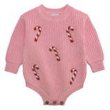 Pink knit baby sweater bubble with red and white crochet candy canes and wood button leg closure