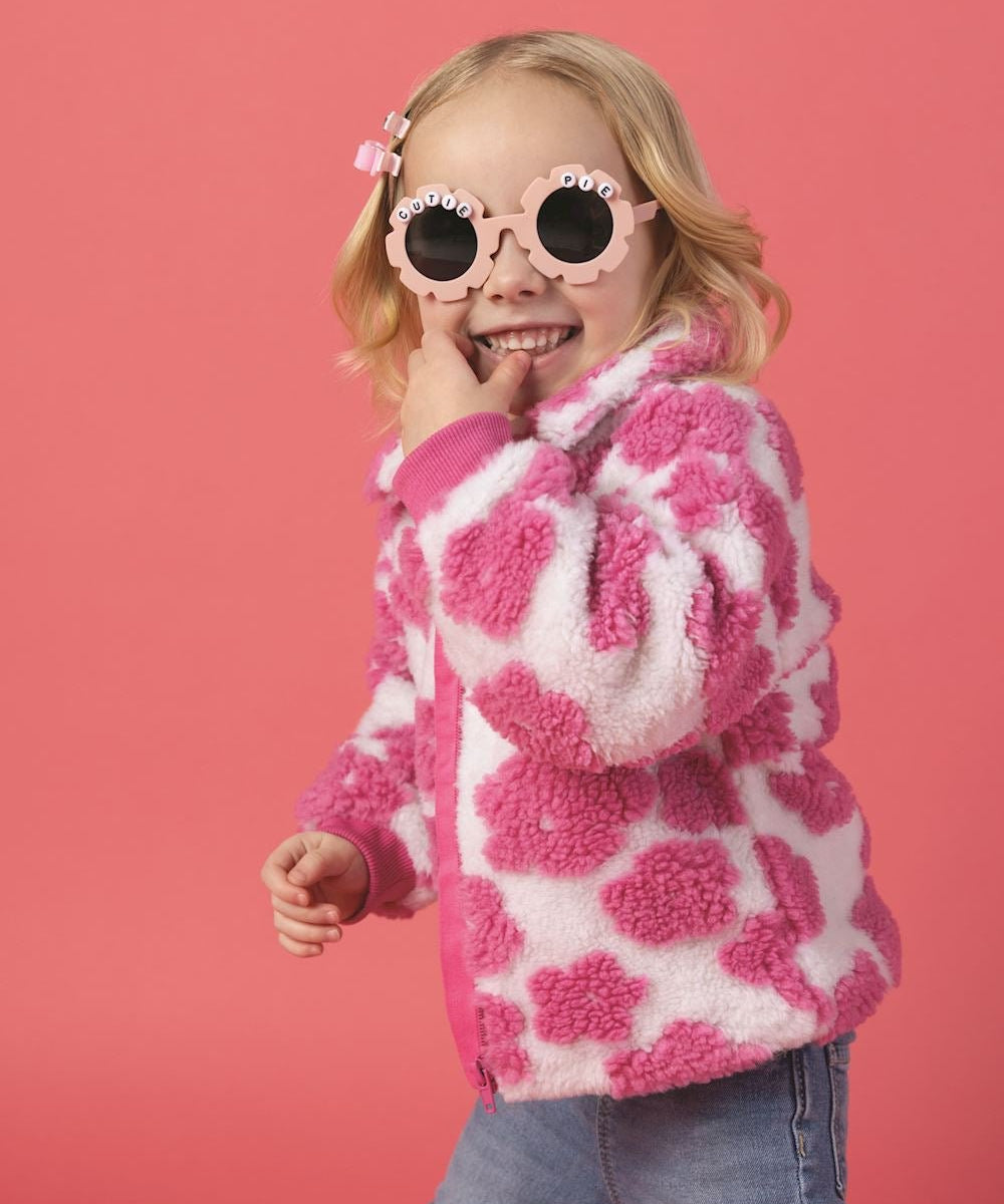 Pink and cream toddler sherpa jacket with fuzzy flower pattern, front zipper, and ribbed cuffs