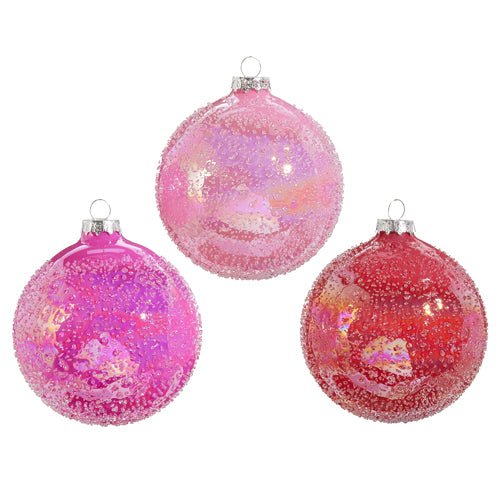 Set of three 4-inch pink glass glitter ball ornaments in assorted shimmering designs.