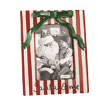 Santa and child photo in red and white striped ceramic Christmas frame with green bow