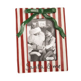 Santa and child photo in red and white striped ceramic Christmas frame with green bow