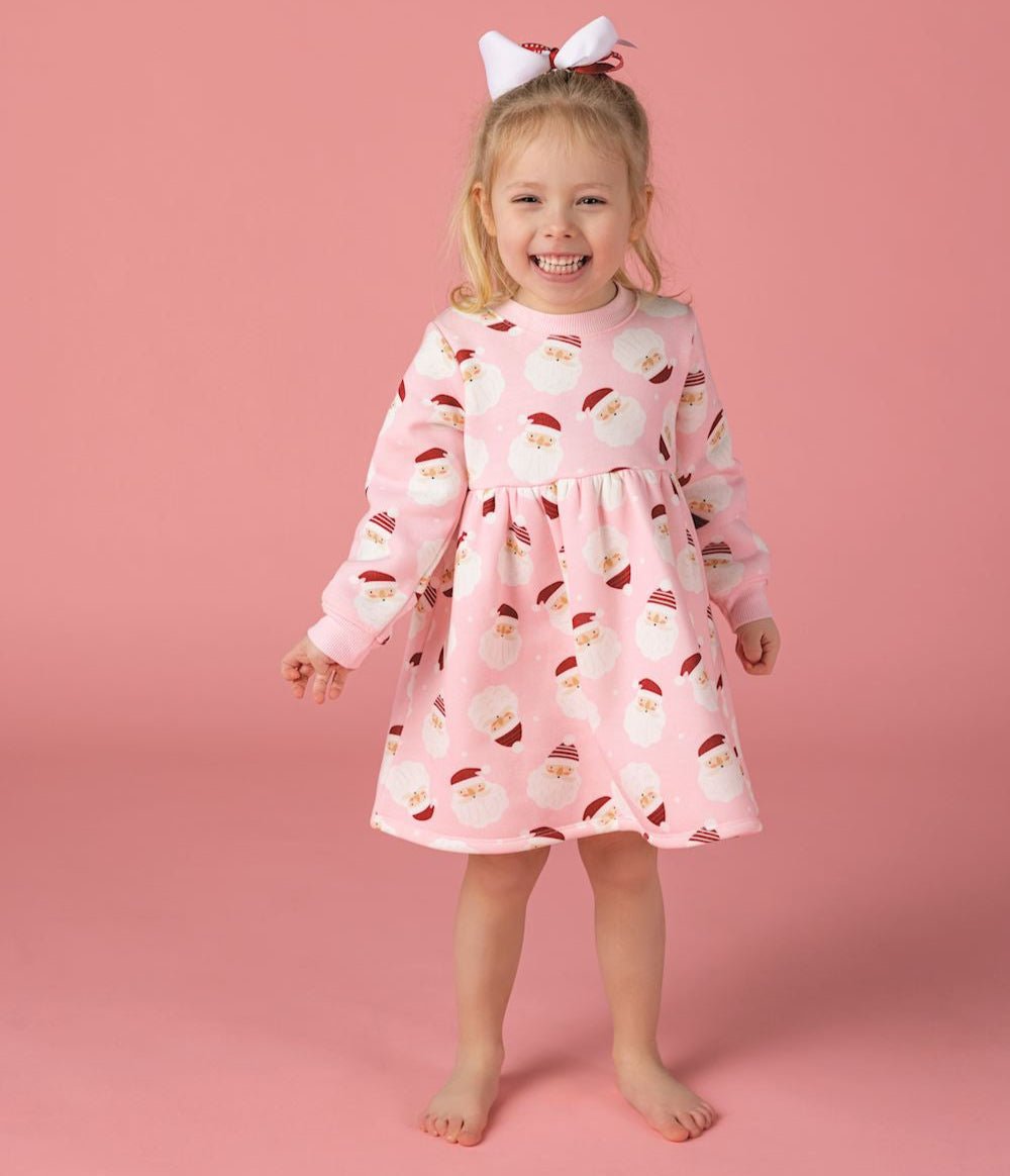 Pink girls’ sweatshirt dress with Santa face print and long sleeves