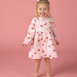 Pink girls’ sweatshirt dress with Santa face print and long sleeves