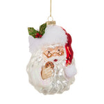 5-inch Santa Claus ornament in red suit holding a cookie, made of glass, resin, and polyester.
