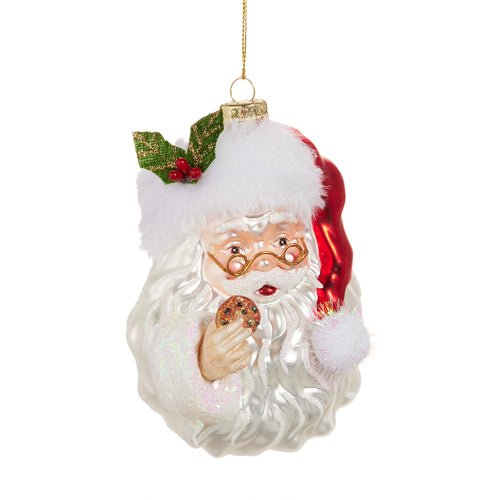 5-inch Santa Claus ornament in red suit holding a cookie, made of glass, resin, and polyester.