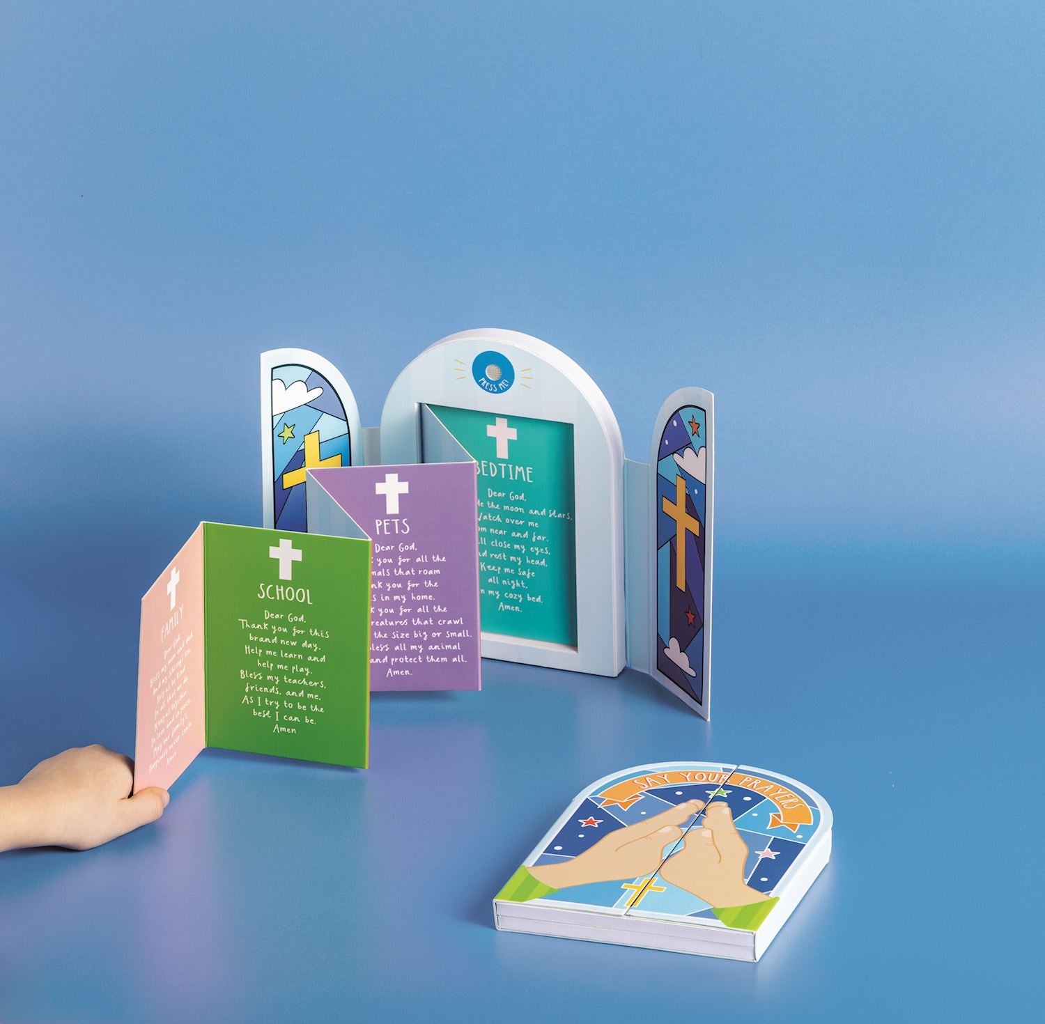 Say Your Prayers fold-out board book with cross window design and music feature