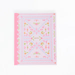 Floral patterned fabric square with pink border on a white background
