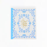 Decorative card with blue floral pattern and 'Do good, choose wisely' text on a white background