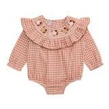 Orange gingham long-sleeve baby bubble with embroidered turkey smocking, ruffle collar, and leg snap