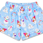 Children’s Corey Paige Snow Days plush shorts with multicolor holiday graffiti-style print, back pocket, and elastic waistband.