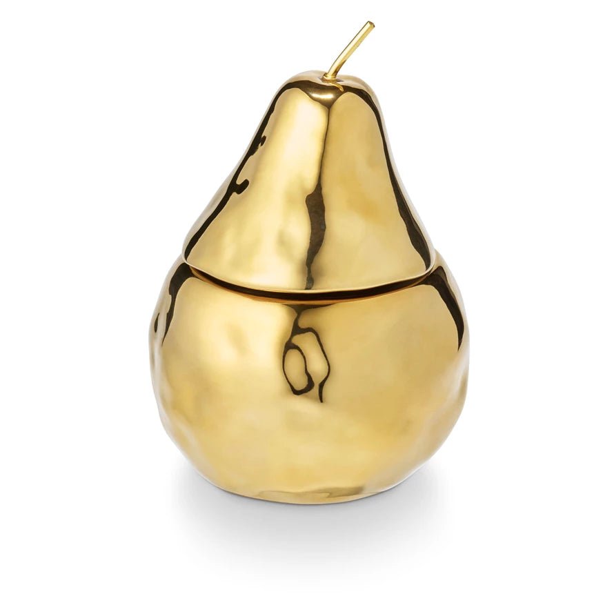 Spiced Pear candle in a shiny gold pear-shaped jar with sweet and spicy holiday scent