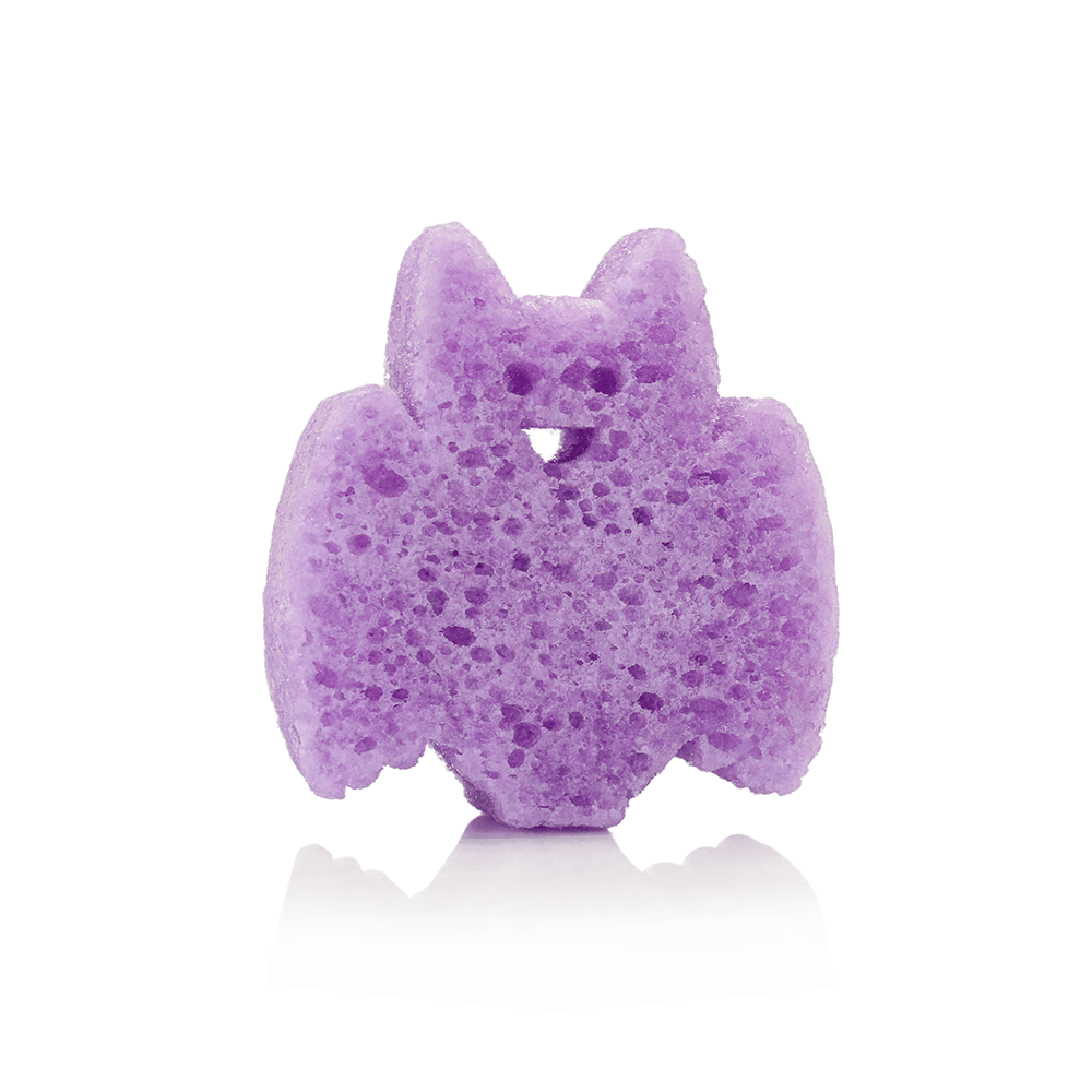 Purple bath sponge shaped like a bat on a white background