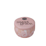 Sweet Grace travel-size tin candle with blush and white pattern