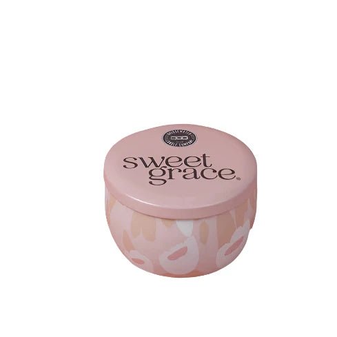 Sweet Grace travel-size tin candle with blush and white pattern