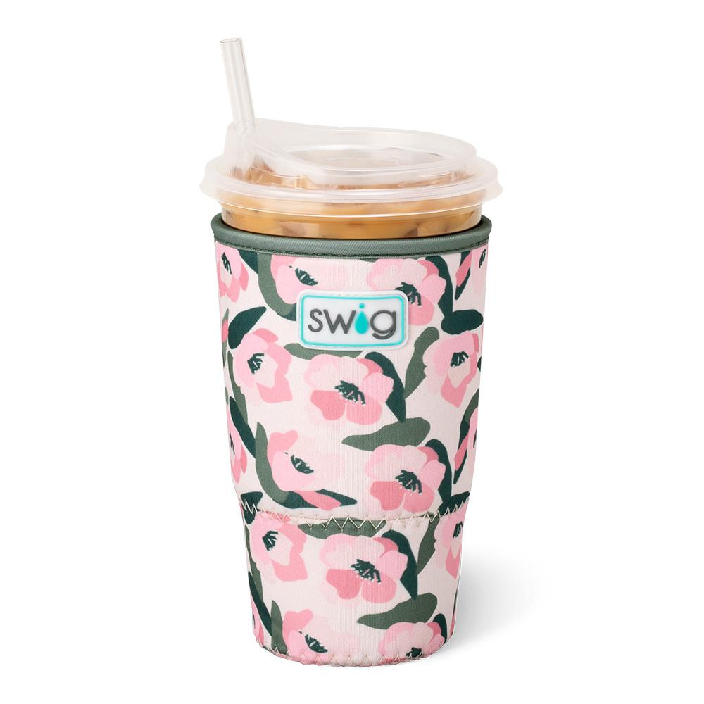 Large floral neoprene iced drink sleeve holding an oversized iced coffee cup