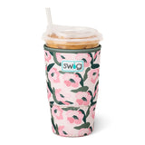 Large floral neoprene iced drink sleeve holding an oversized iced coffee cup