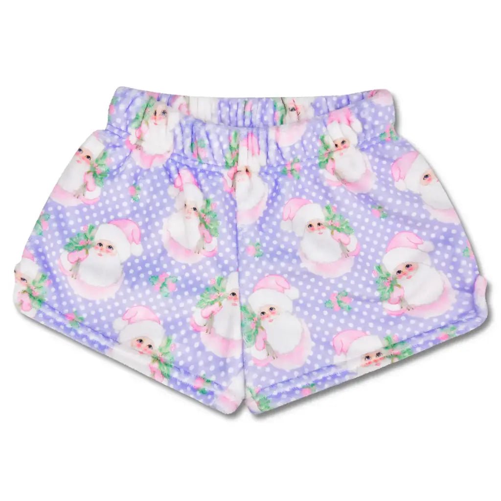 Children’s Sweet Santa plush shorts with pastel purple background, pink Santa print, back pocket, and elastic waistband.