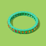 Green bracelet with colorful square charms