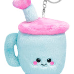 Plush blue travel cup keychain with pink fuzzy lid, smiling face, and sparkly straw and feet
