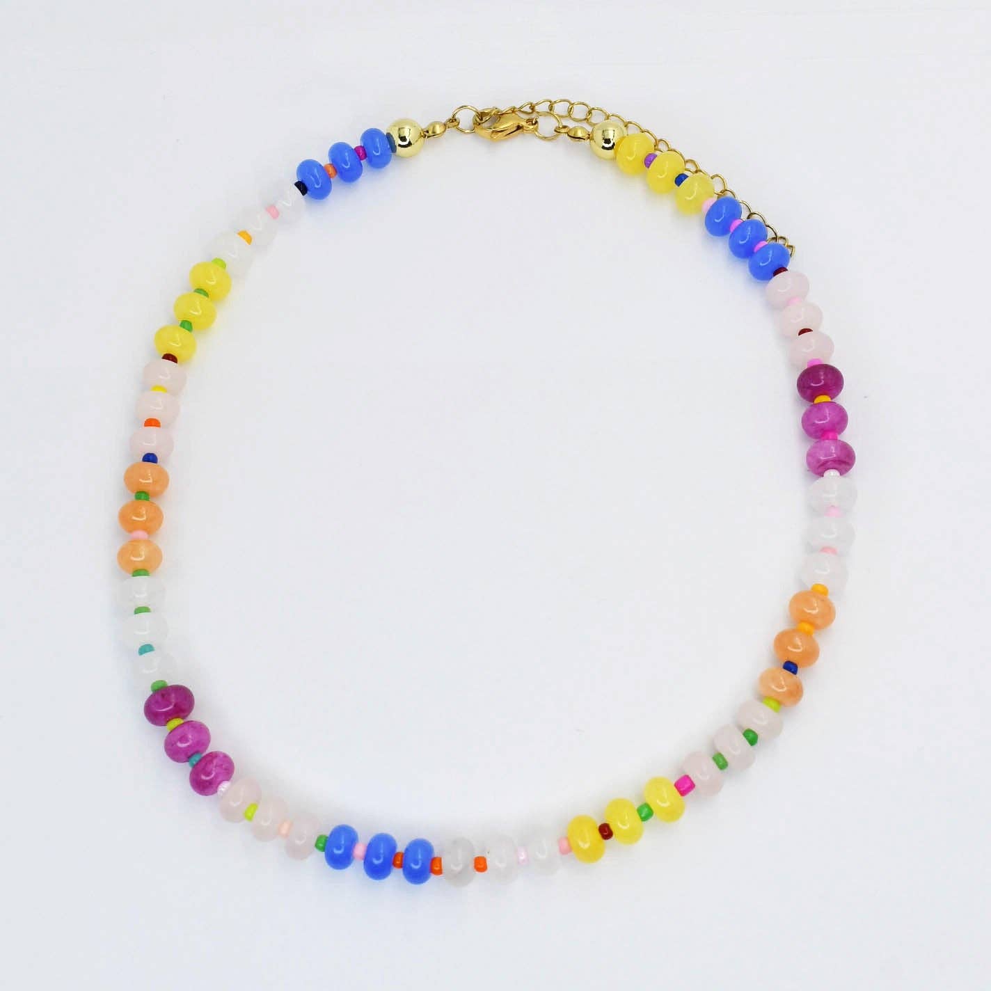 Colorful beaded necklace on a white background