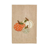 Chambray hand towel with three embroidered pumpkins and French knot detail