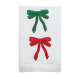 White linen towel featuring embroidered red and green bows with hemstitch detail.
