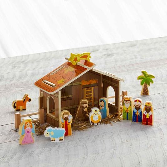 Wooden nativity set with barn and twelve figurines including Mary, Joseph, Baby Jesus, and Wise Men