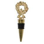 Gold wreath wine stopper with bow detail by Mary Square, perfect for holiday entertaining.