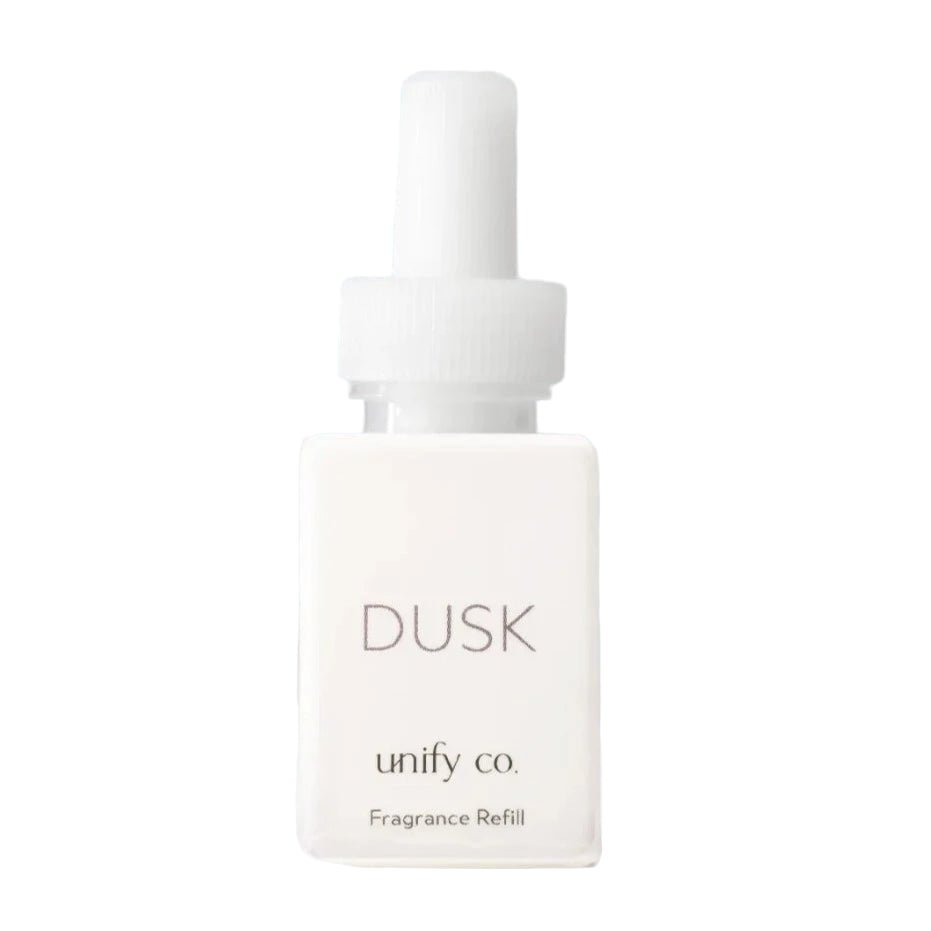 Dusk Pura fragrance refill with exotic florals, softwoods, patchouli, and Madagascar ylang ylang notes.